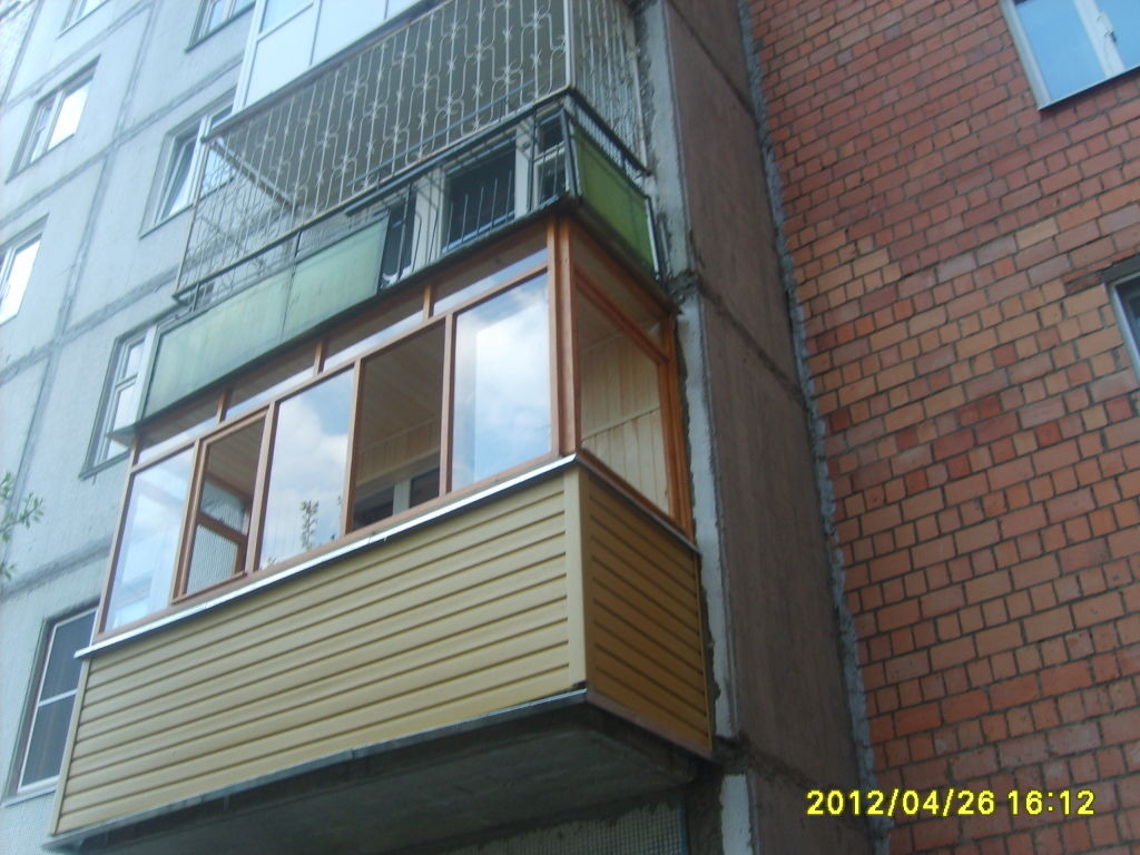 Отделка балкона в кирпичном доме
